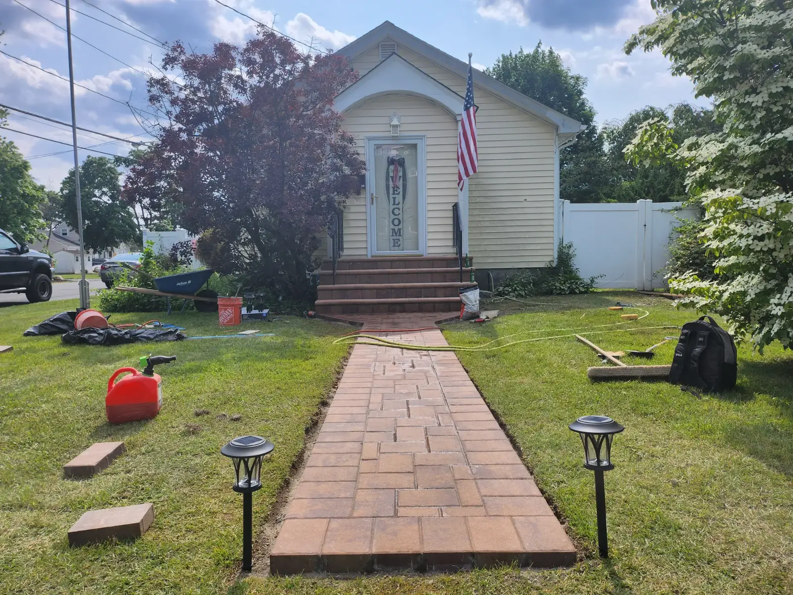 Brick-tone paver walkway by Promaster Maintenance Corp, Long Island, NY
