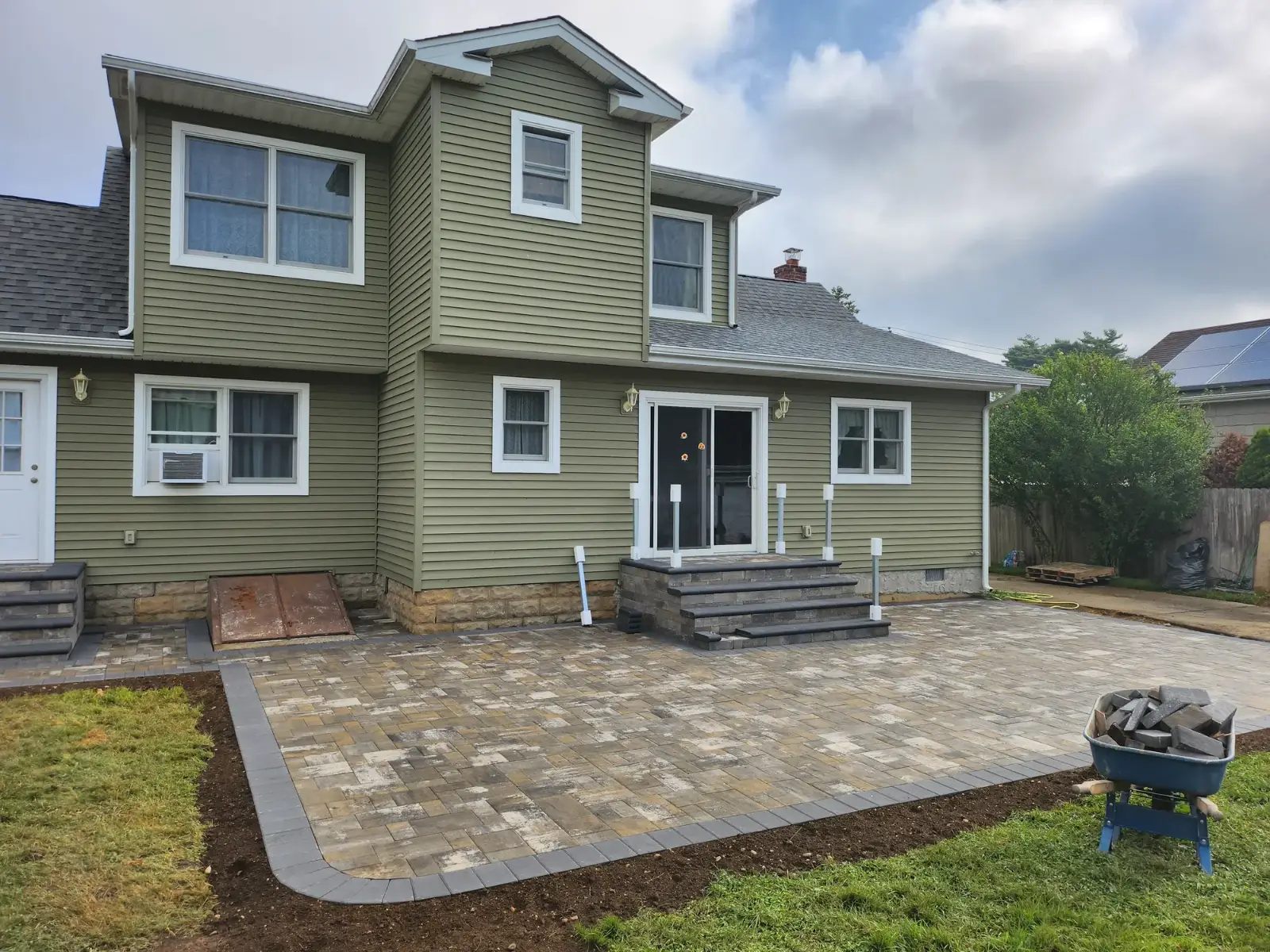 Rear patio with paver steps by Promaster Maintenance Corp, Long Island, NY