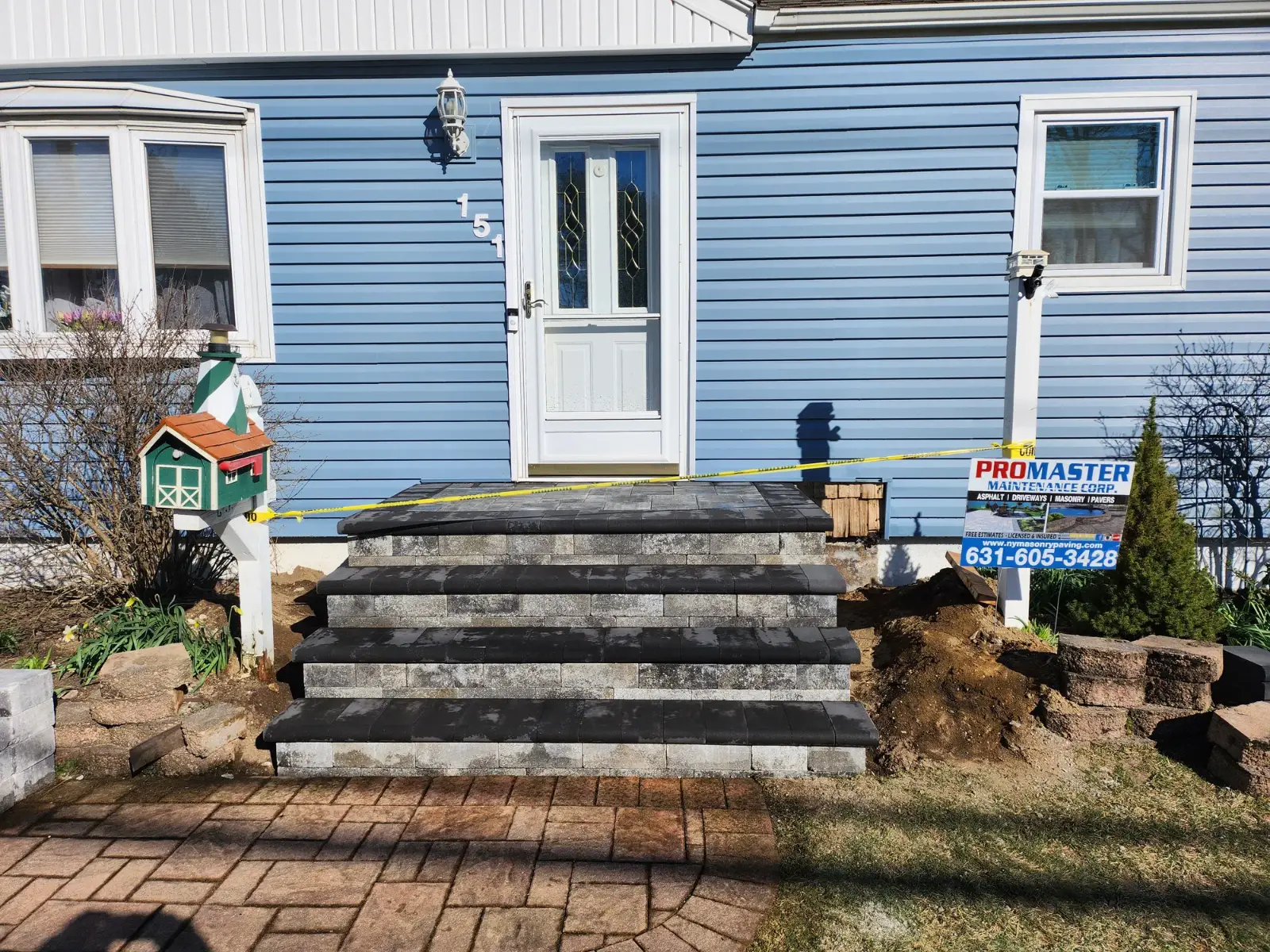 Four-step paver stoop by Promaster Maintenance Corp, Long Island, NY