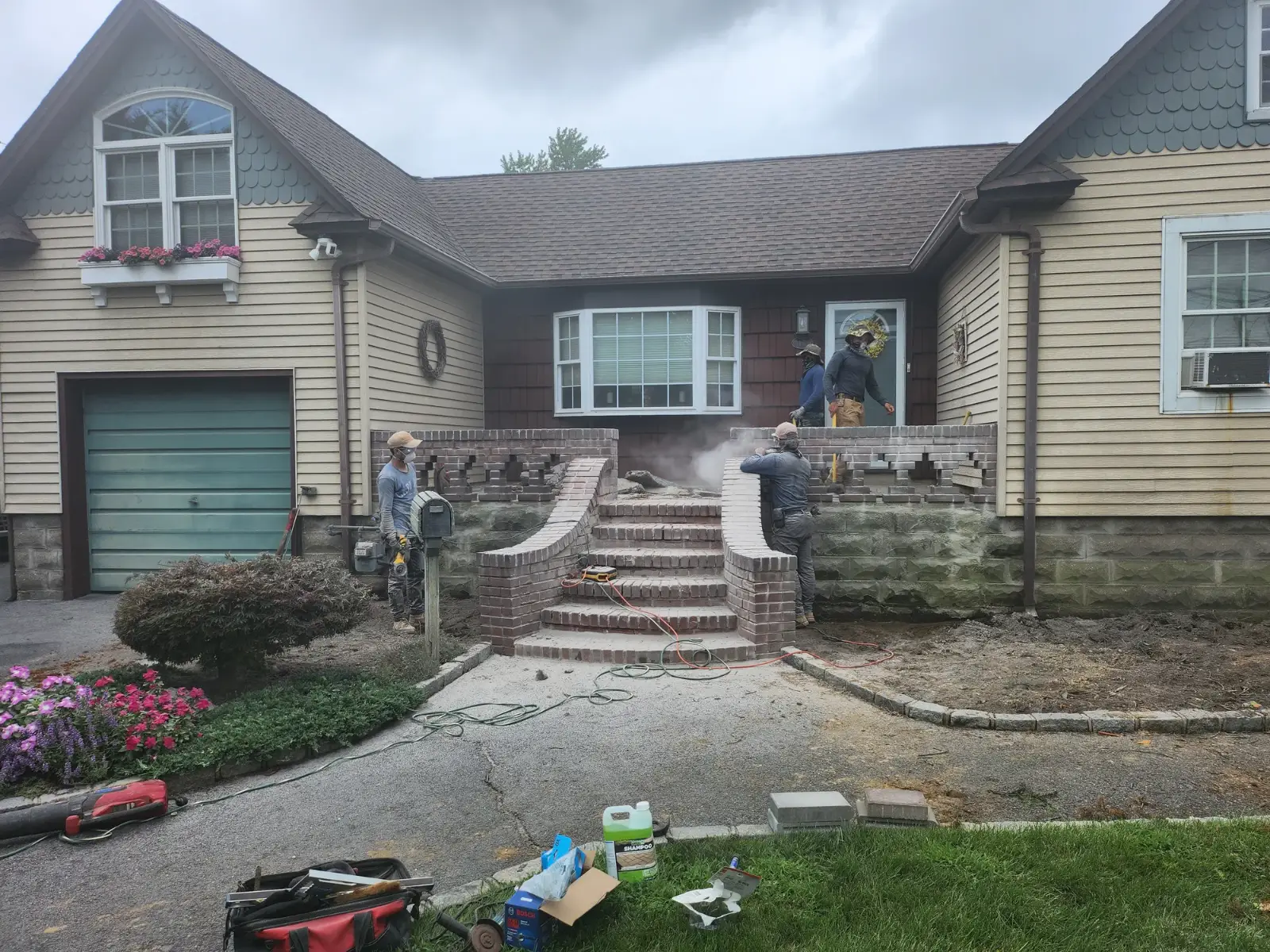 Brick stoop restoration in progress by Promaster Maintenance Corp, Long Island, NY