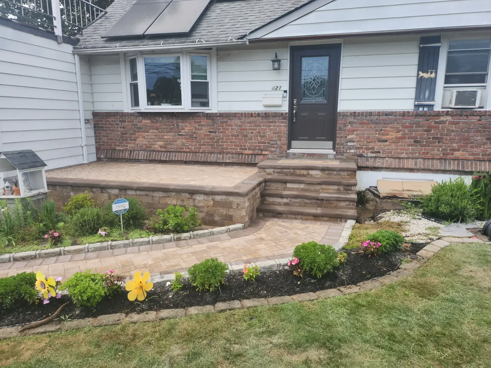 Raised paver porch, steps and walkway by Promaster Maintenance Corp, Long Island, NY