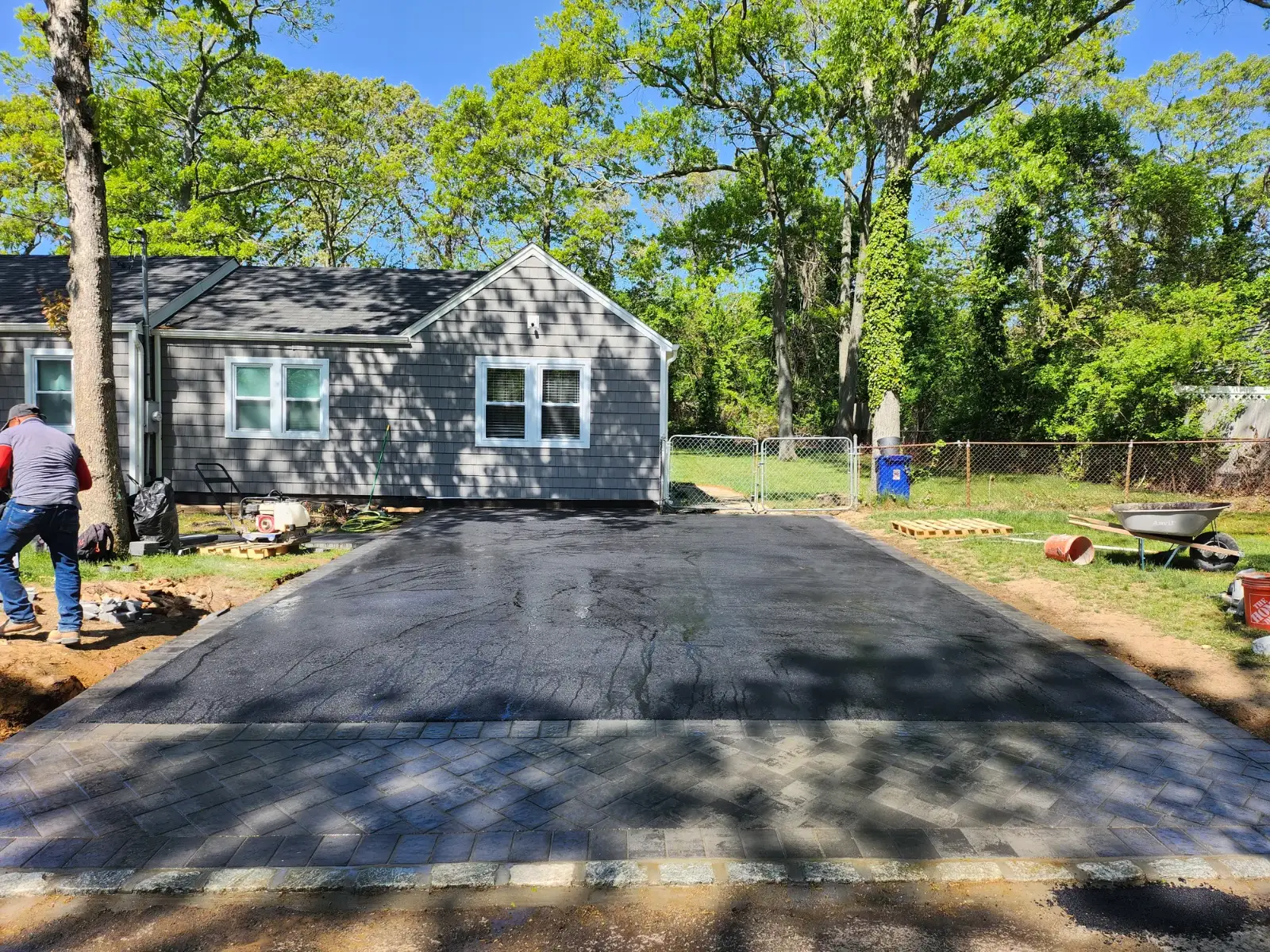 Asphalt driveway with herringbone apron by Promaster Maintenance Corp, Long Island, NY