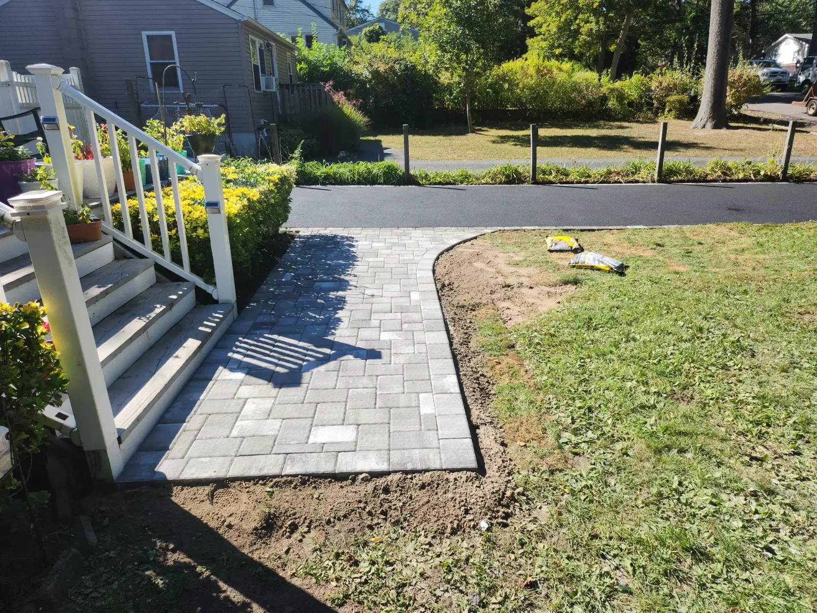 Paver walkway to deck steps by Promaster Maintenance Corp, Long Island, NY
