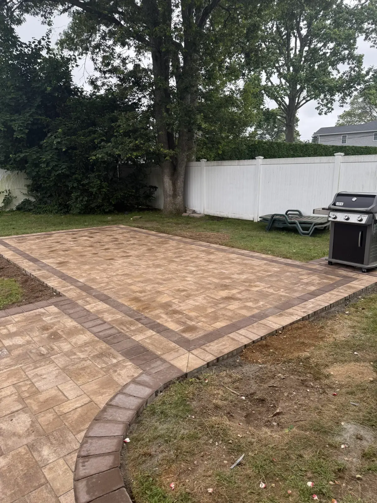 Paver patio with soldier border by Promaster Maintenance Corp, Long Island, NY