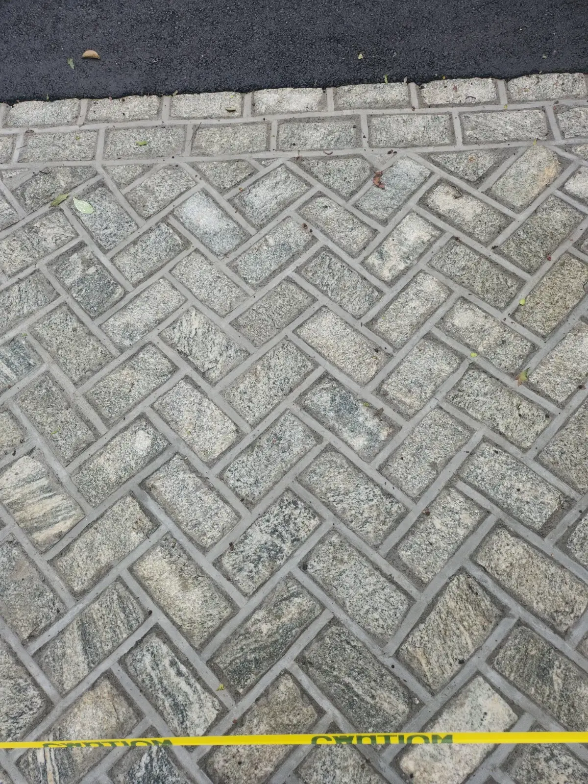 Asphalt driveway with granite herringbone apron by Promaster Maintenance Corp, Long Island, NY