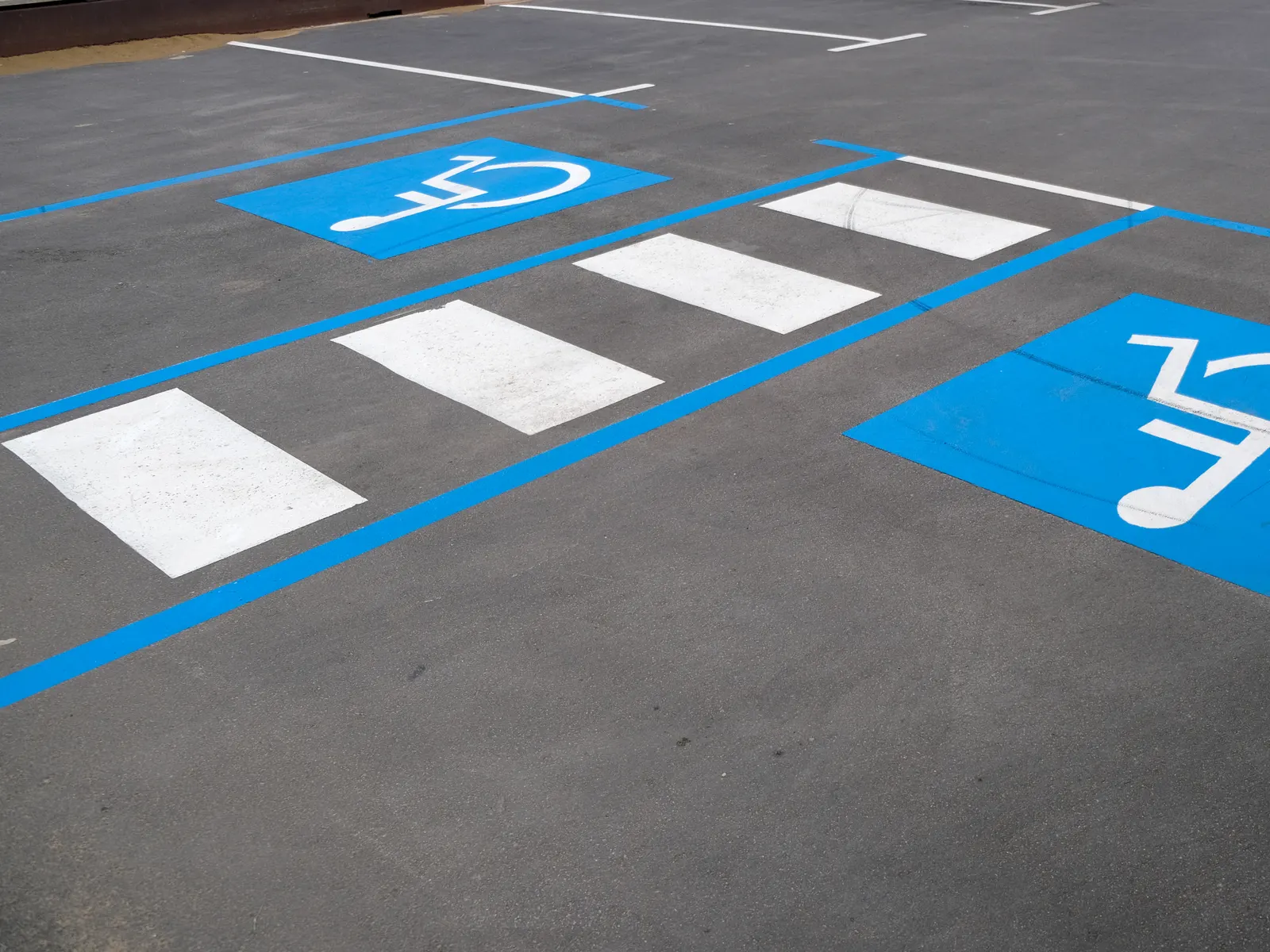 Accessible parking bays marked in blue