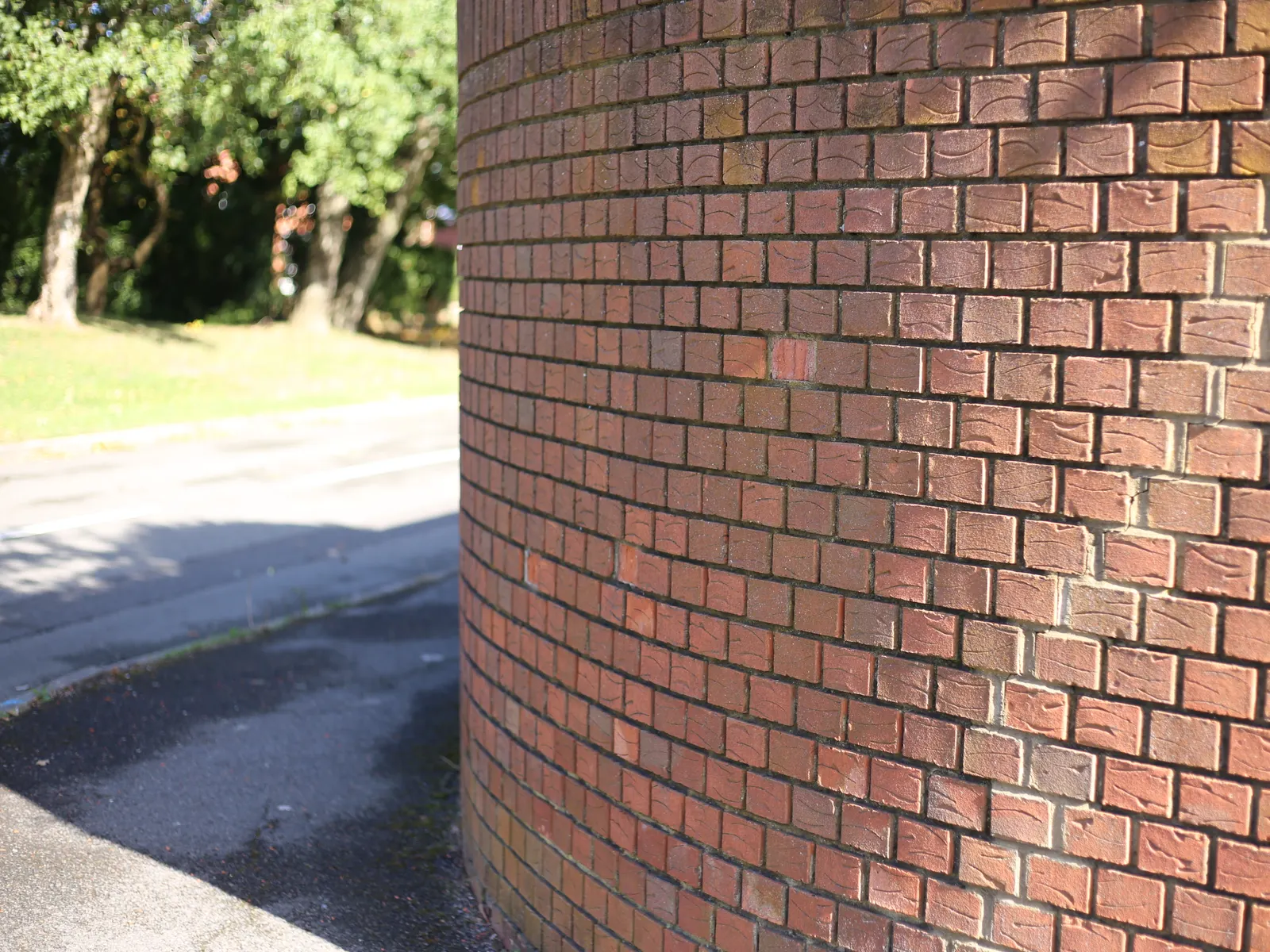 Curved brick wall with fresh pointing