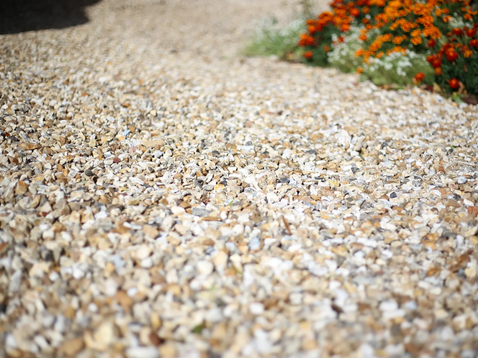 Golden gravel driveway surface